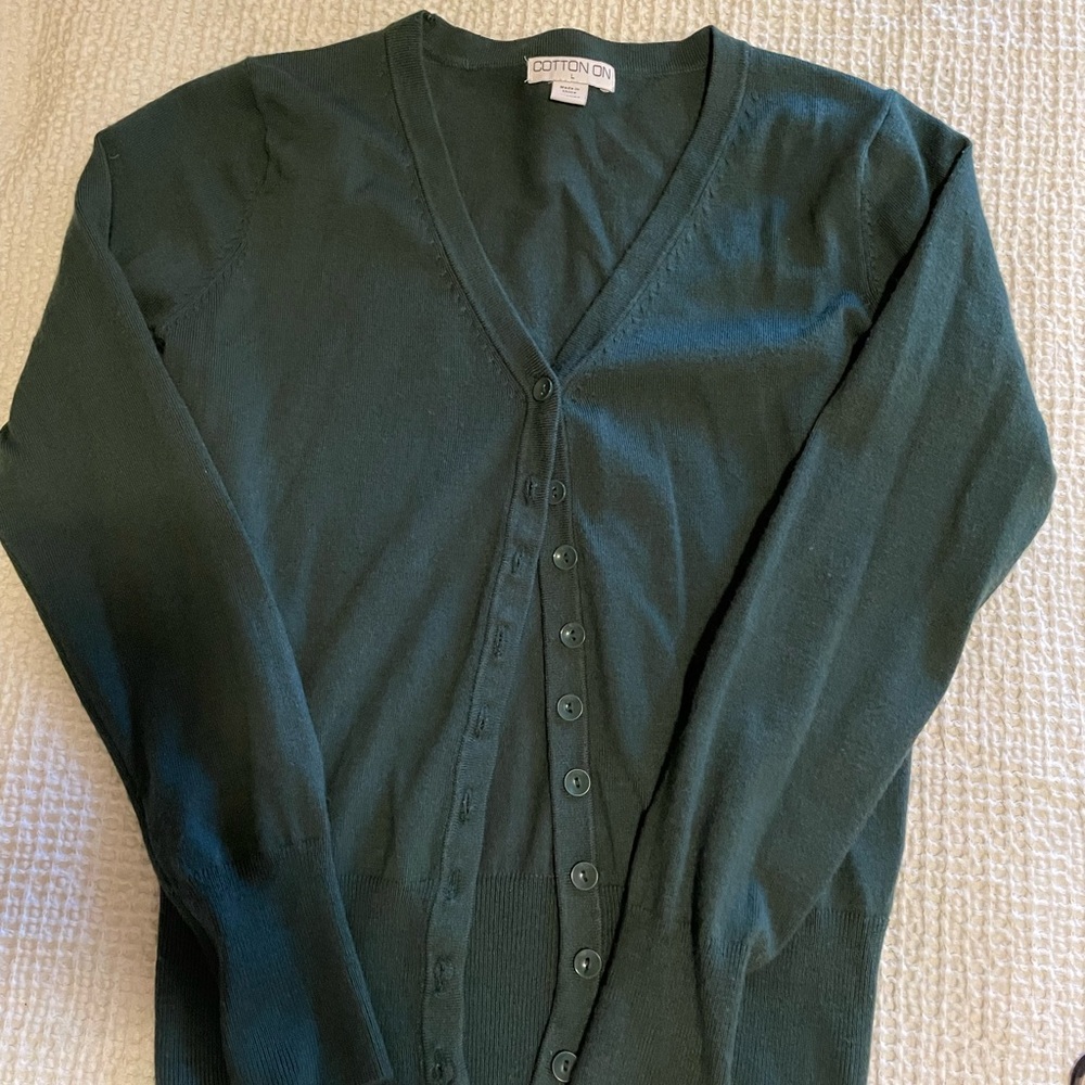 Hunter green cardigan.
